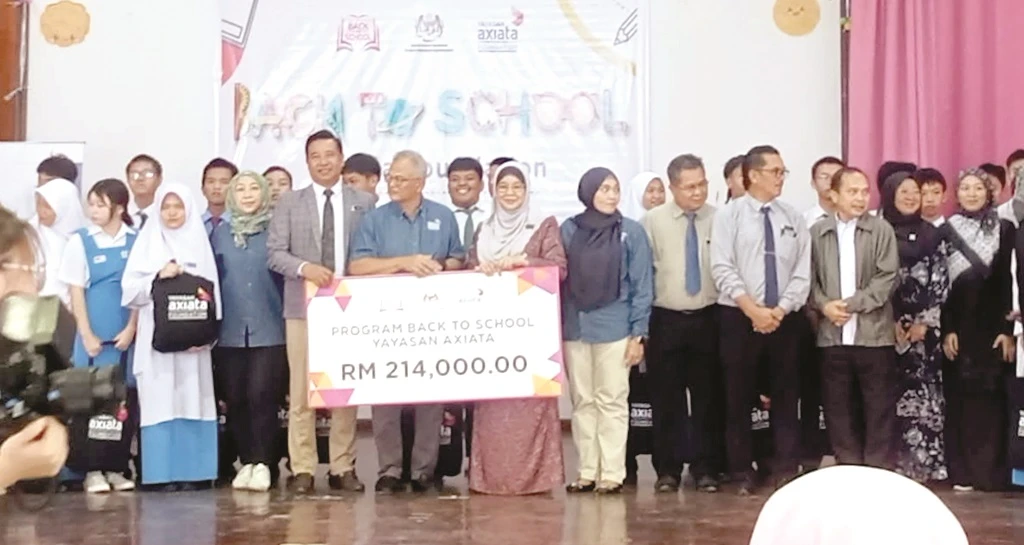Back-to-School programme: RM214k Axiata aid for 1,000 Ranau students